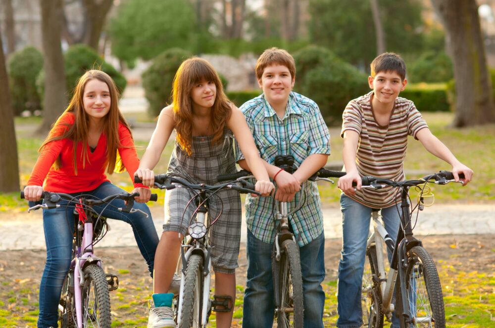 Teenagers on bikes