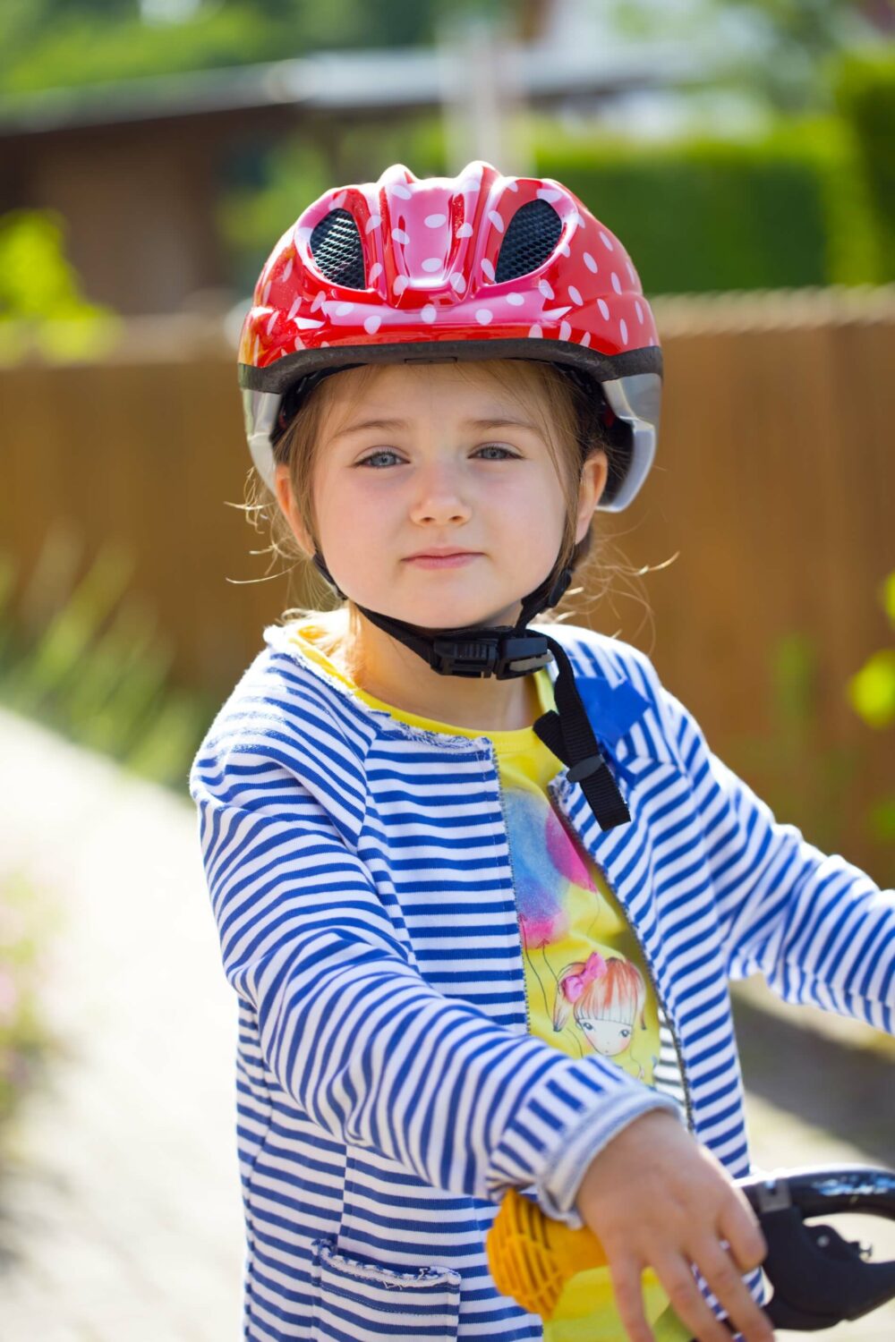 Correctly tightened kids bike helmet