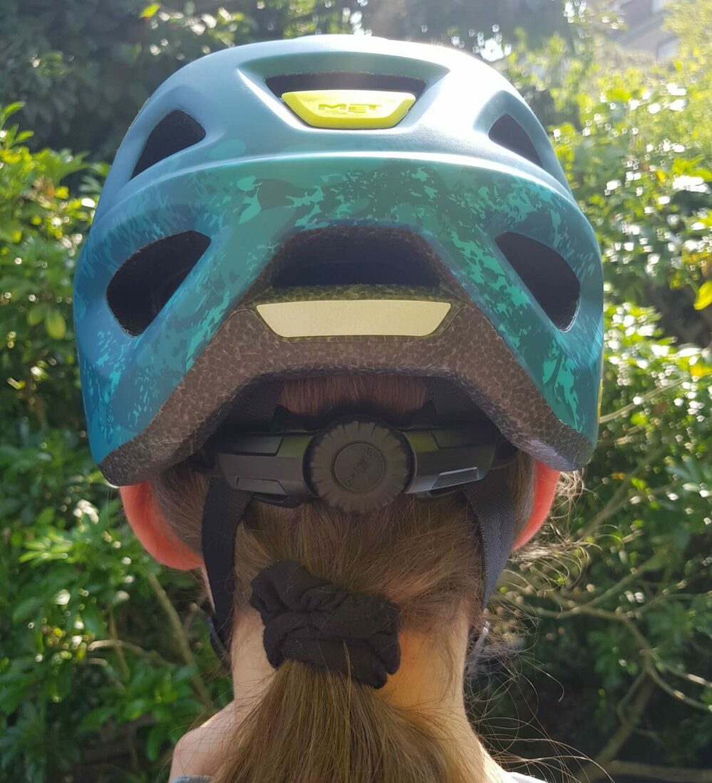 kids bike helmet girl with ponytail