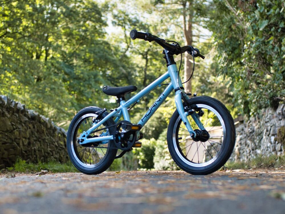 Photo of the Hornit Hero 14 kids bike with the pedals back on after having them removed 