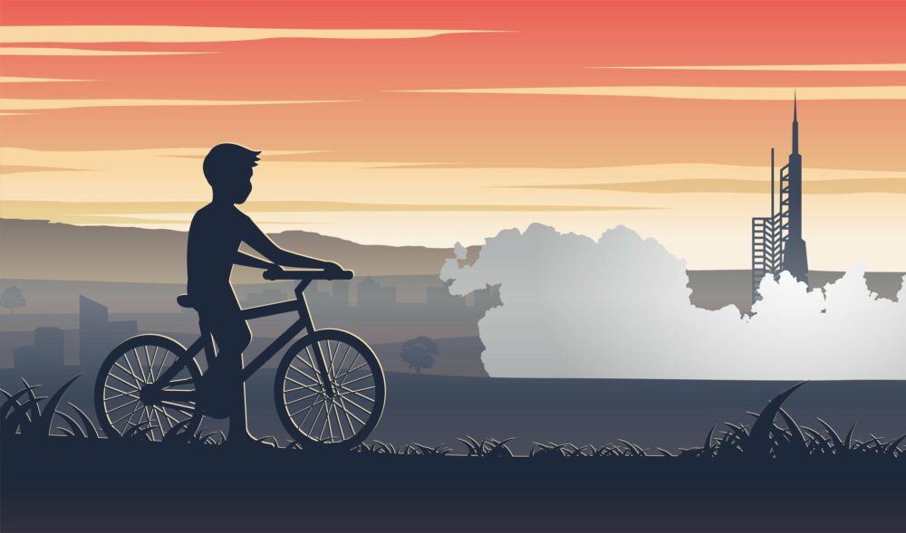 Building cycle paths shouldn't be like rocket science - drawing of boy on a bike watching a space rocket launch