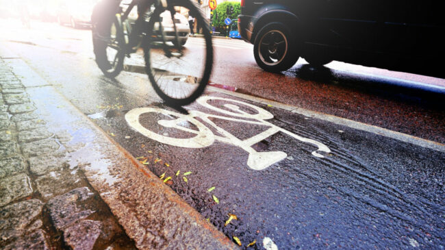 Bike lane in rain and traffic