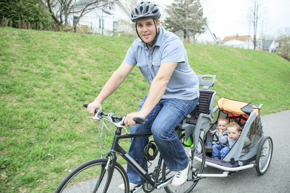 A cheap bike trailer is a great way to start cycling with small toddlers and children