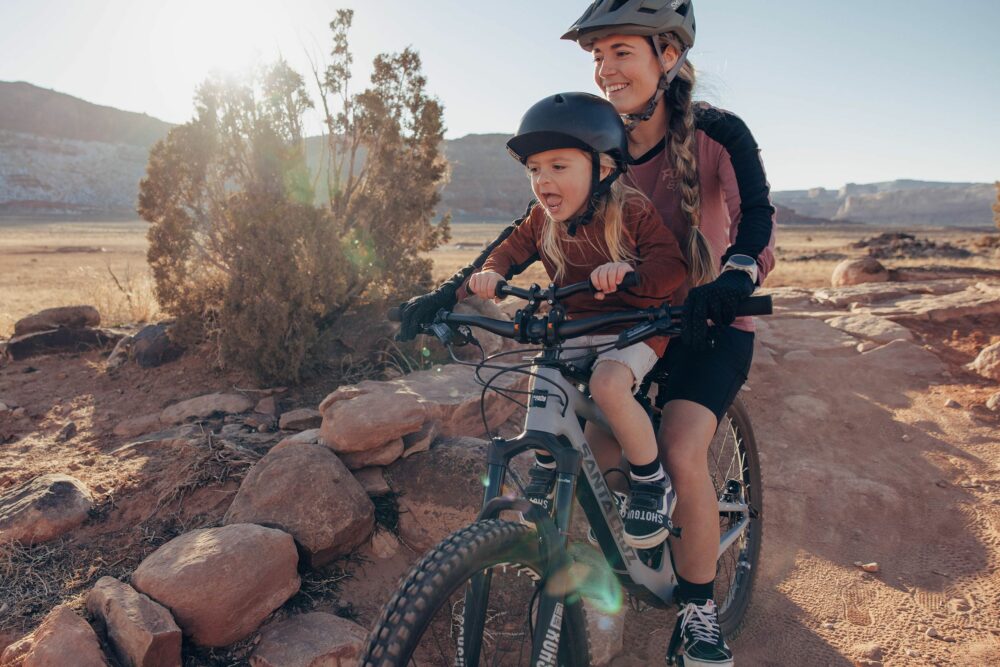 Mother and daughter kids ride shotgun