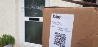 Delivery of a Bike Club kids bike to the front door in a large bike box