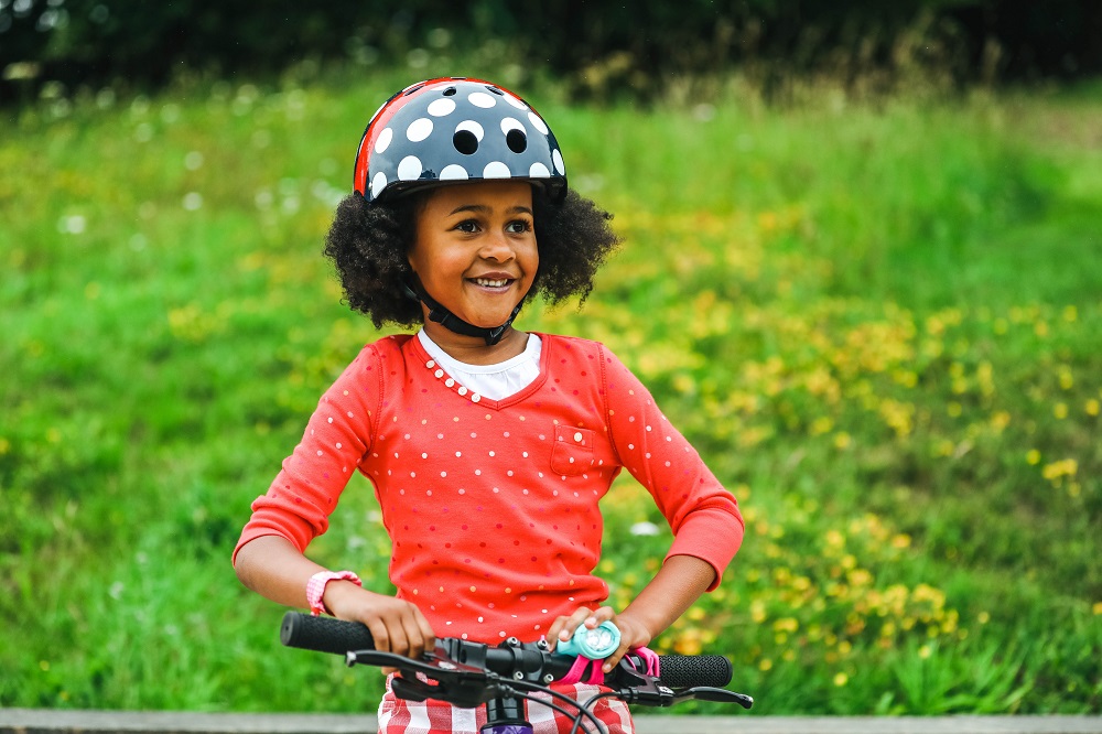 Best bike helmets for afro hair need to have additional space for the hair.  Skate style cycle helmets like these fun Hornit helmets in fun designs are a good choic