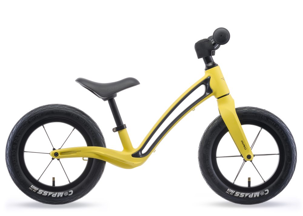 Best kids' bikes: A yellow Hornit balance bike on a white background