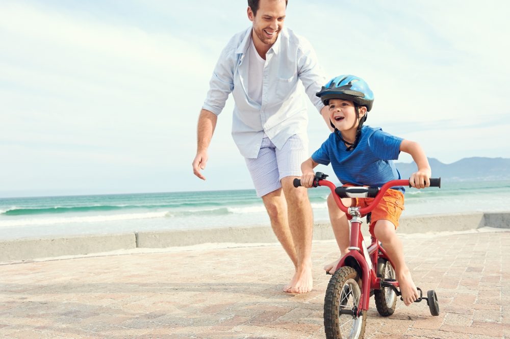Child bare foot learning to ride a bike footwear for learning to ride a bike