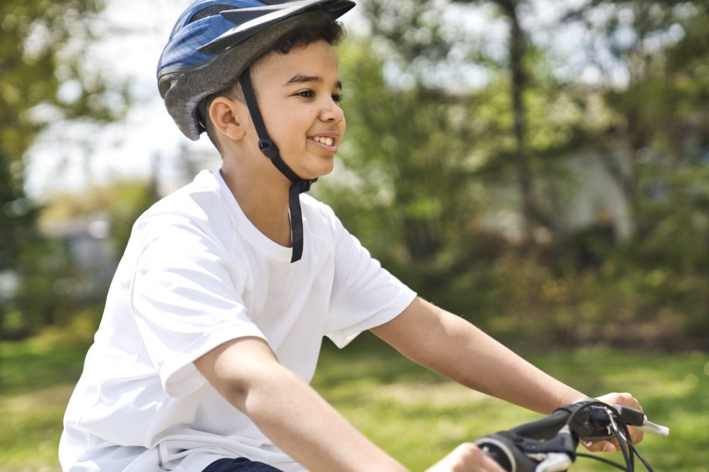 boy riding bike How to start cycling your kids to school