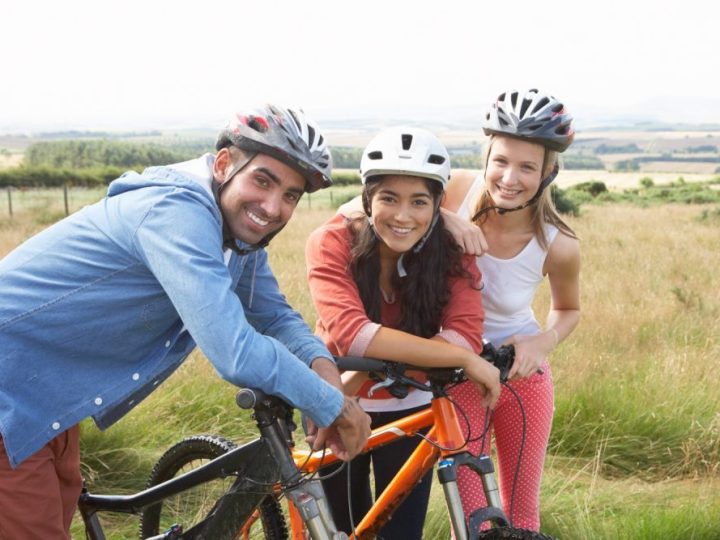 friends riding bikes together