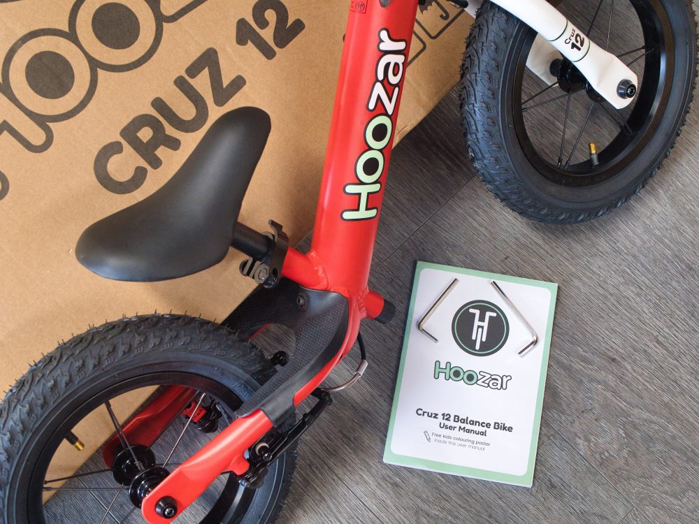 Hoozar Cruz Balance Bike review - the photo shows the red balance bike 