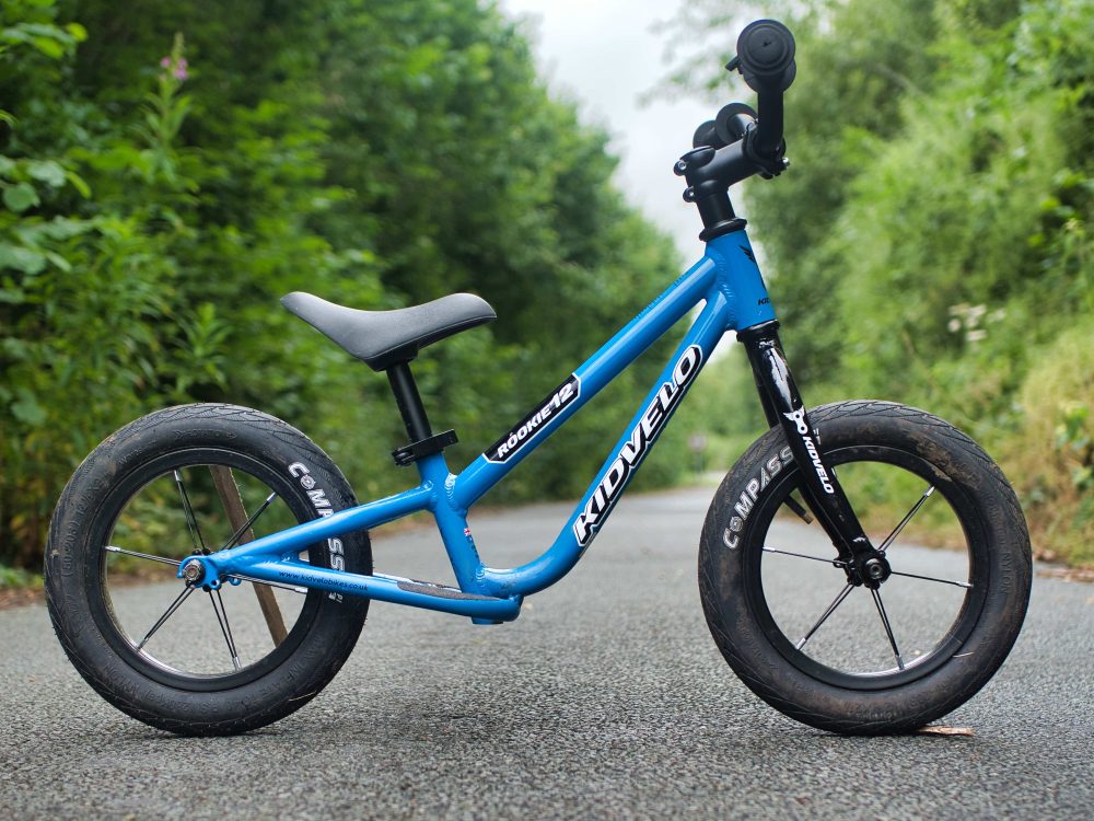 Photo of the blue Kidvelo Rookie 12 balance bike side on - full review