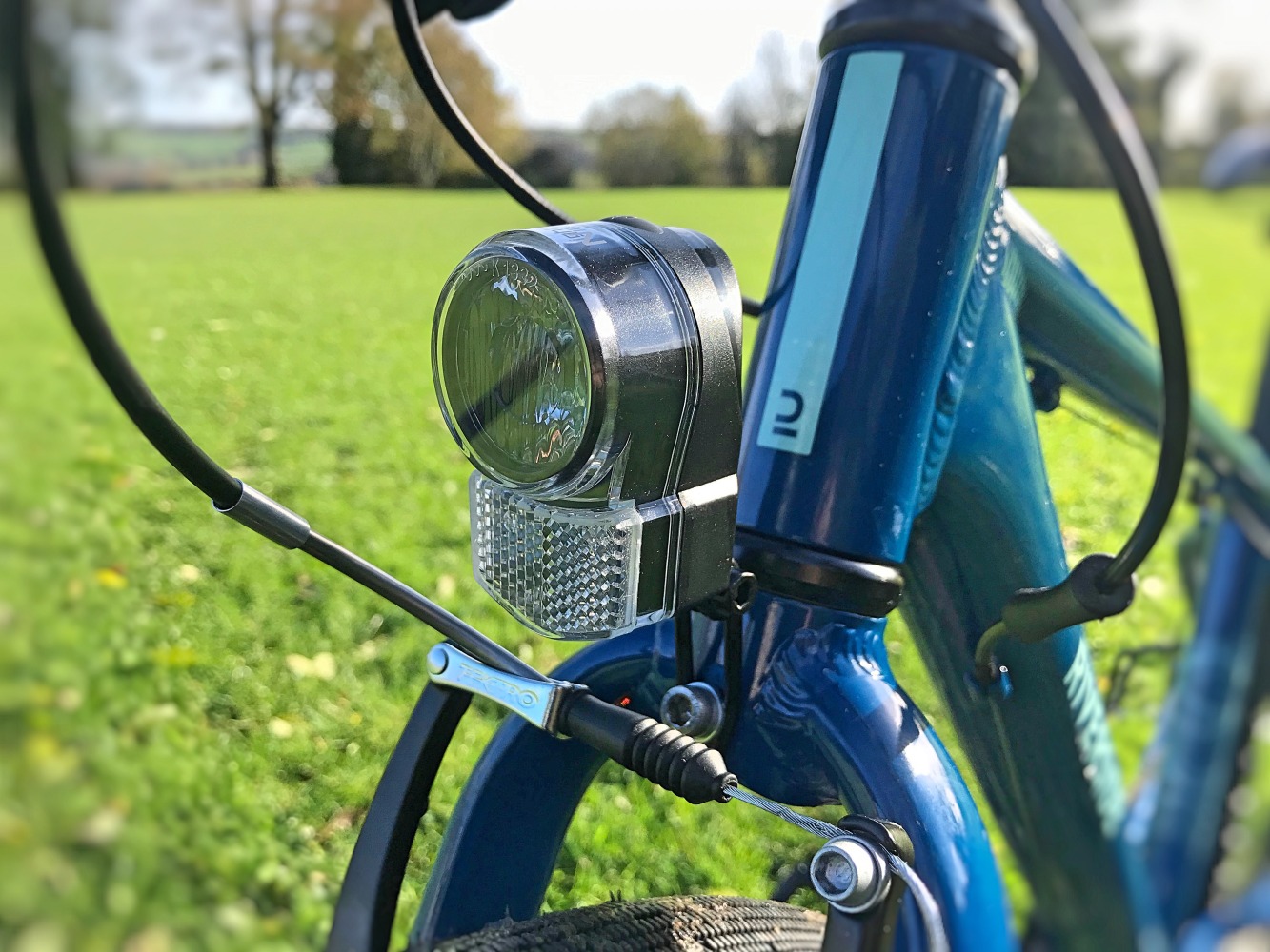 BTwin Riverside 900 26 inch wheel hybrid - front light which comes fitted as standard when you buy this bike