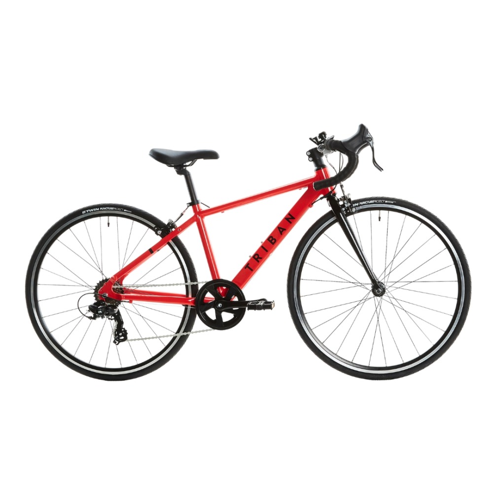 Best 26" kids' bikes: A red Van Rysel Triban 100 road bike on a plain background