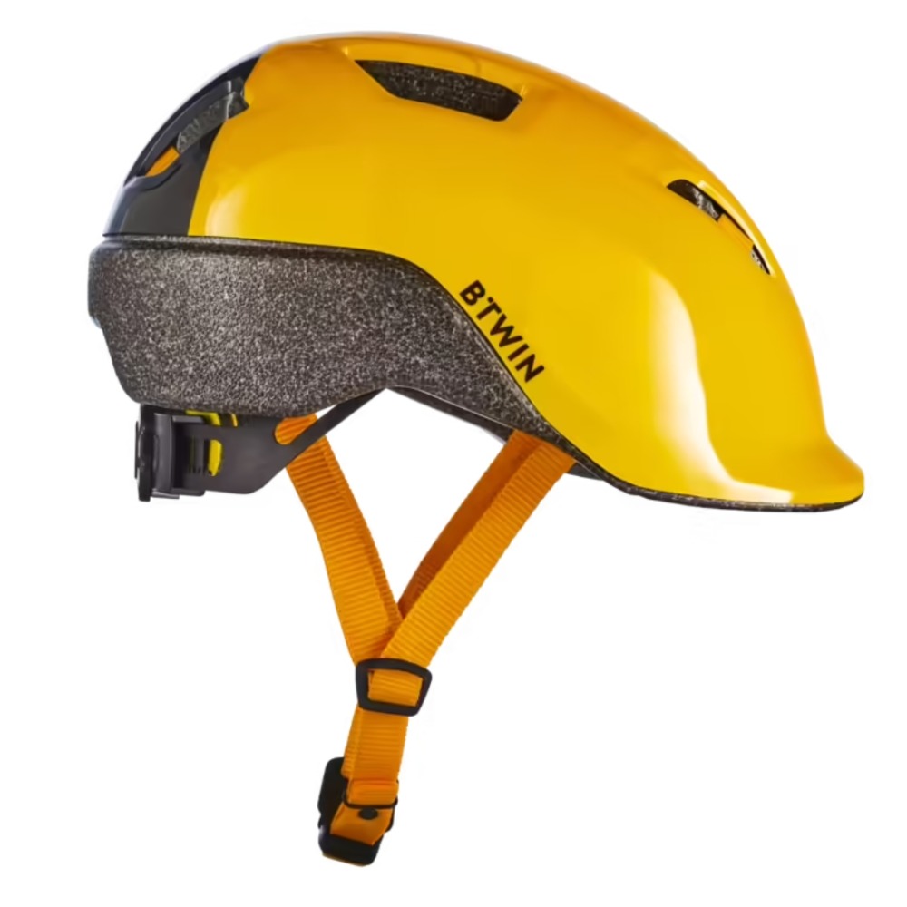 Best kids' bike helmets: A yellow B'Twin 500 helmet seen from the side