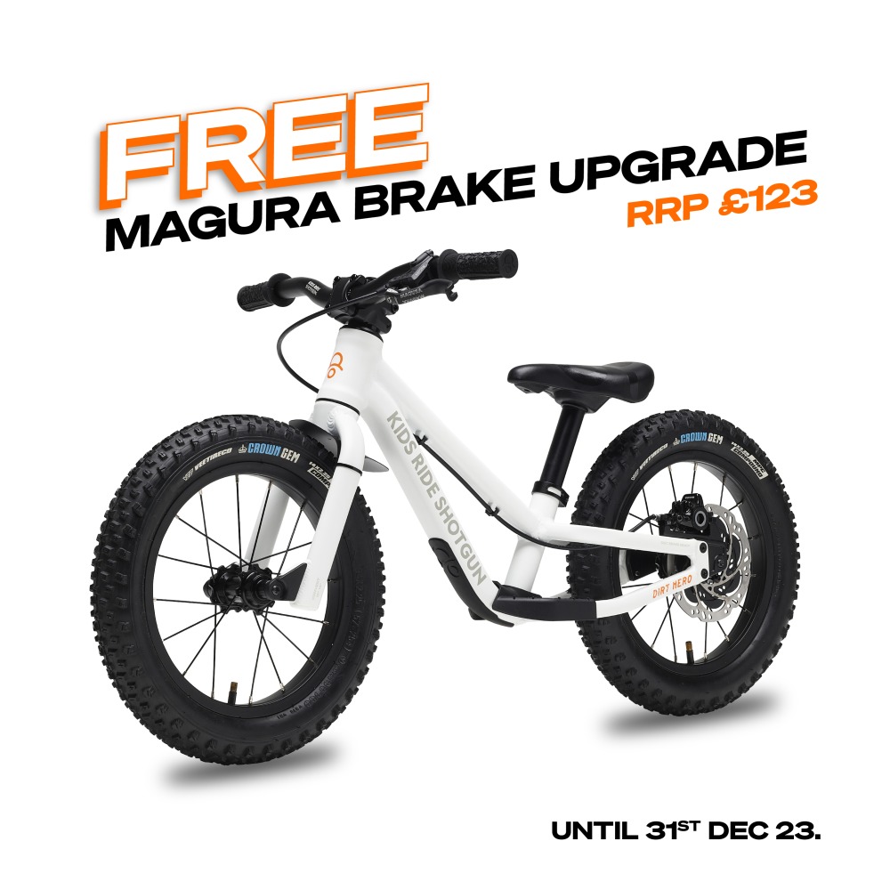 Dirt hero balance bike with text saying FREE magura brake upgrade