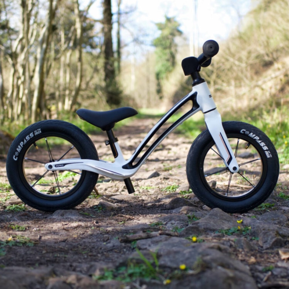 Best balance bikes: A Hornit AIRO photographed in woodland
