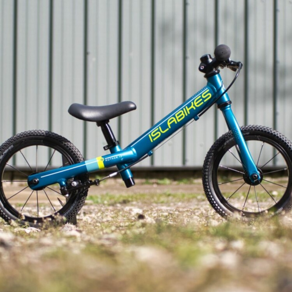Best balance bikes: An Islabikes Rothan photographed in front of a garage door