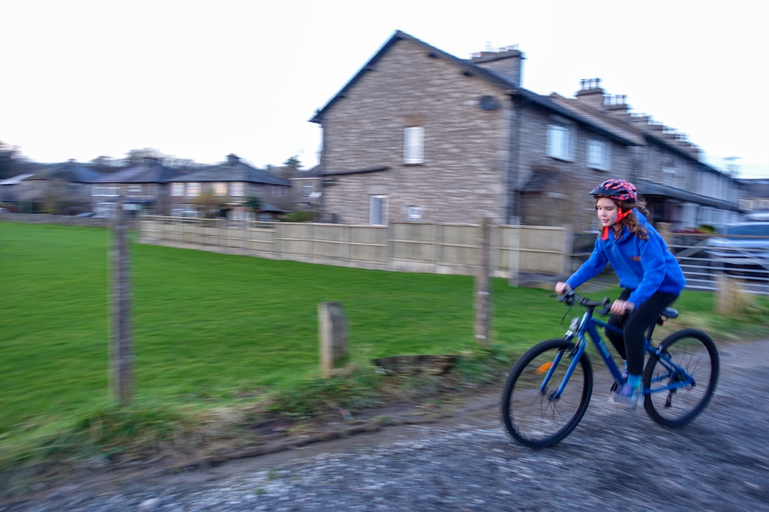 girl in a blue hoodie riding the Blue Riverside 900