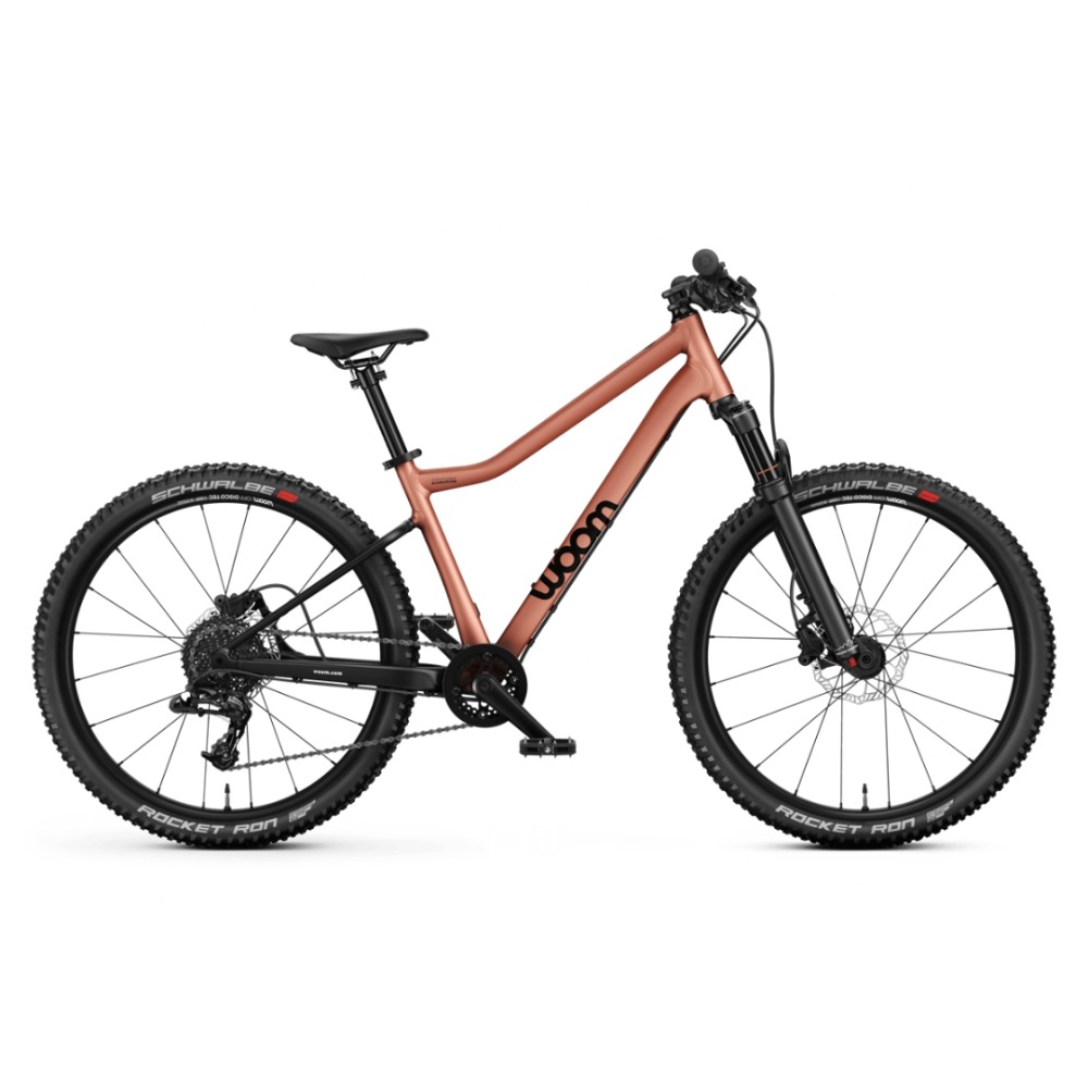 Best 26" mountain bikes for kids: A Woom OFF AIR 6 on a plain background