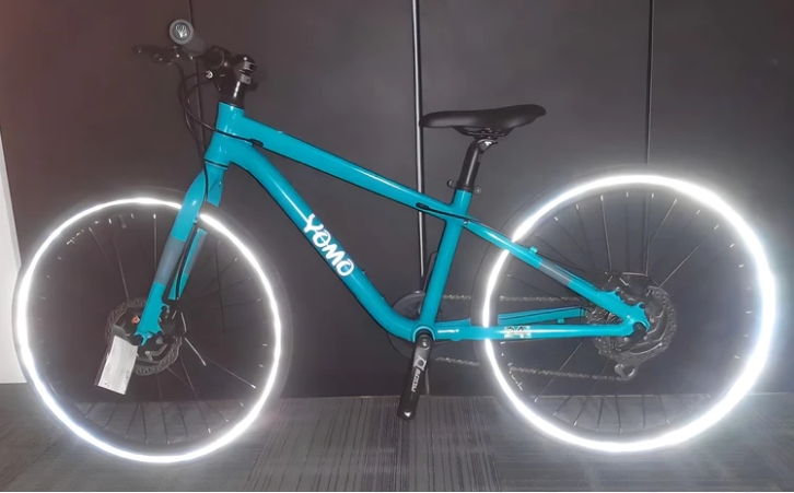 YOMO Kids bike in the dark with reflective tyres for added visibility