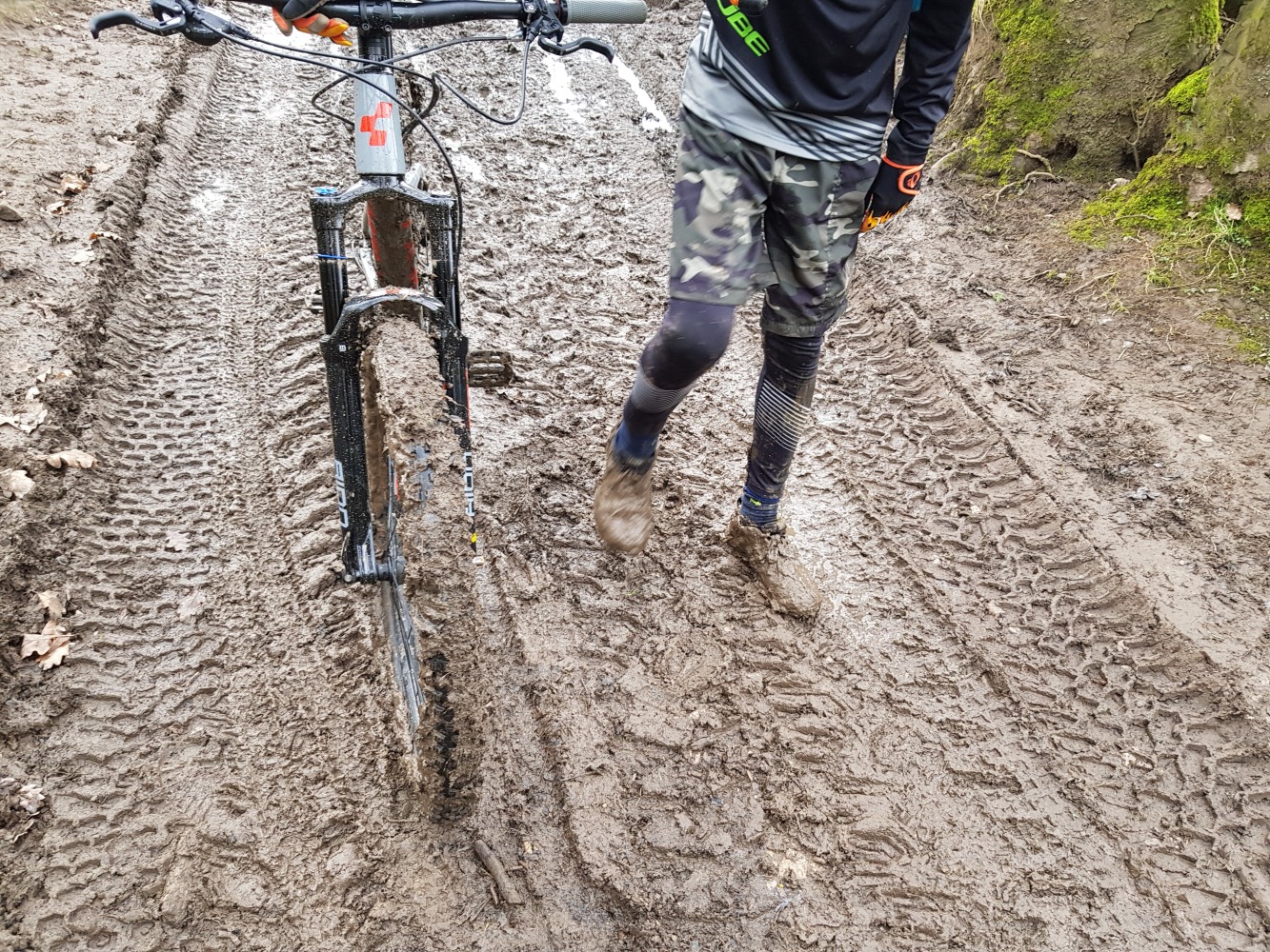 very muddy kids mountainbike