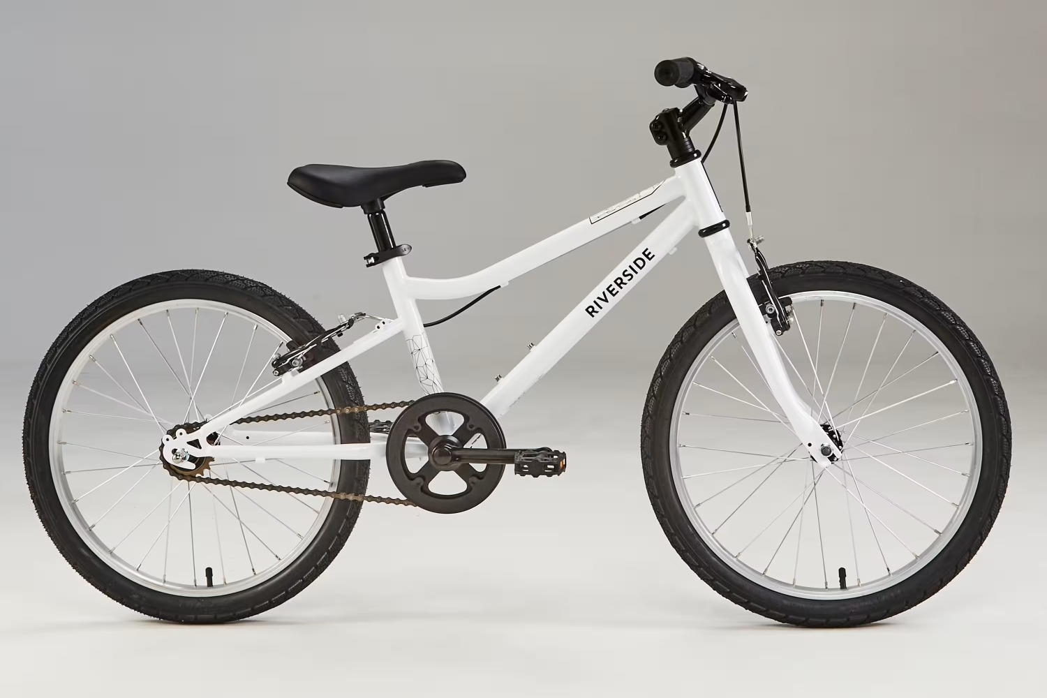 The BTwin Riverside 20 inch wheel kids bike in white with black tyres. This is one of the best value kids bikes in this wheel size available in the UK