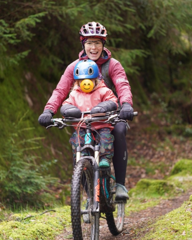 Kids Ride Shotgun seat review, mum and daughter riding on an off road trail in winter