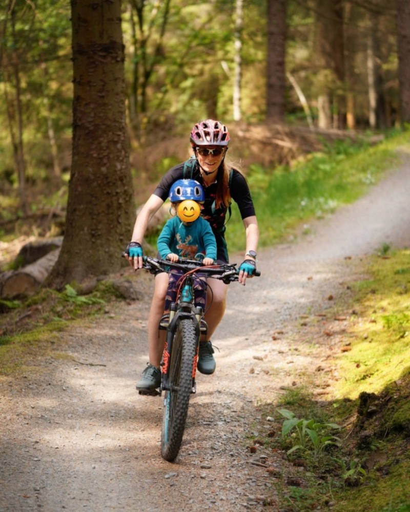 Kids Ride Shotgun seat review, mum and daughter riding on an off road trail