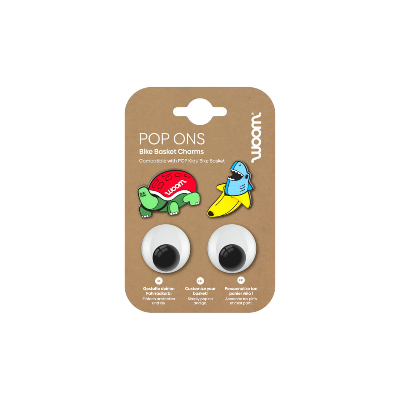 Best bike accessories for kids: Four bike charms attached to a cardboard sleeve, including a turtle, a shark in a banana, and googly eyes