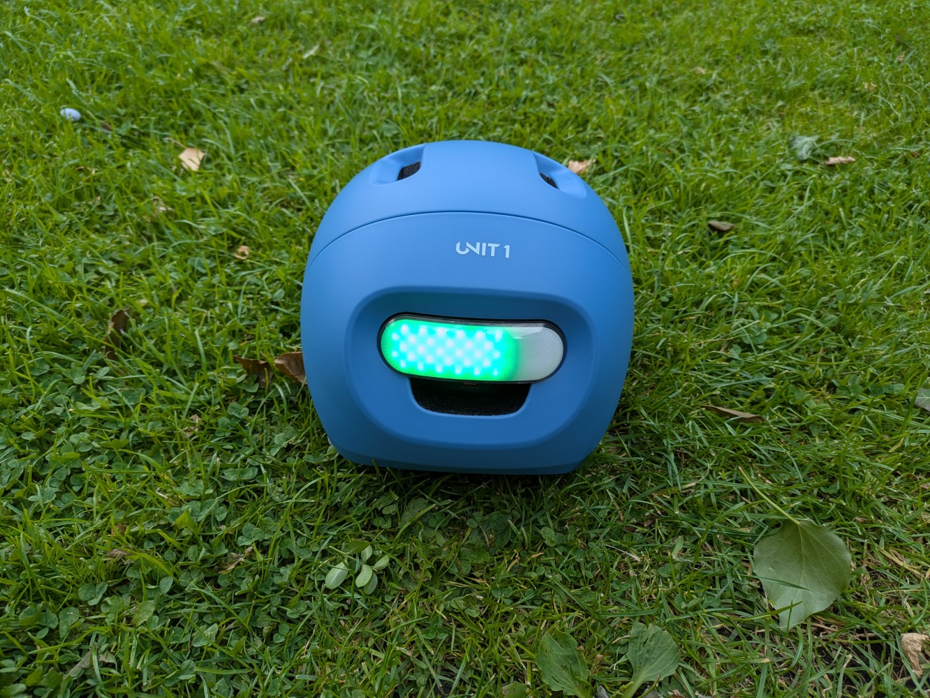 Blue SPARKY helmet with a rear light flashing
