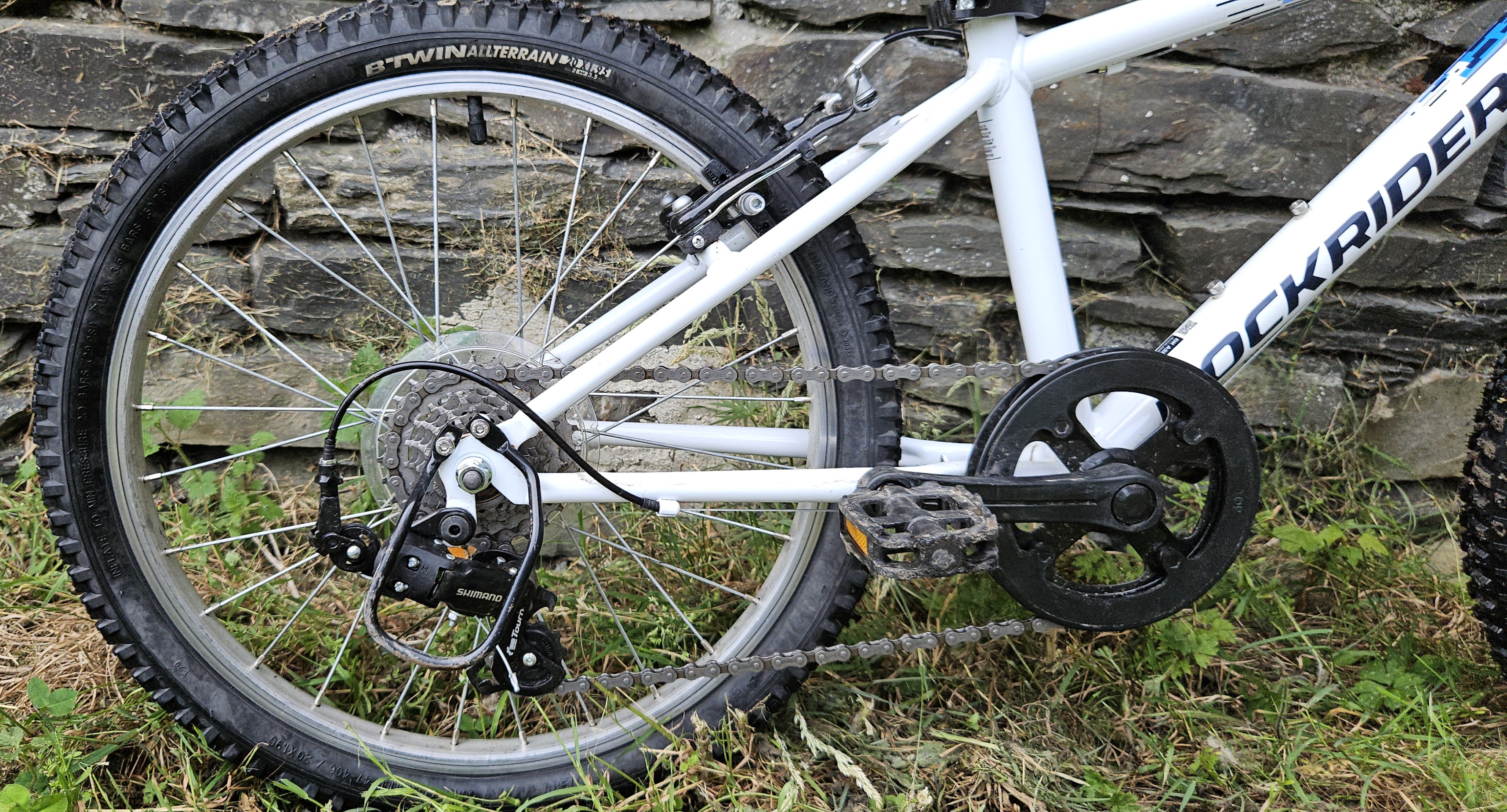 Rockrider 120 rear wheel close up and pedals