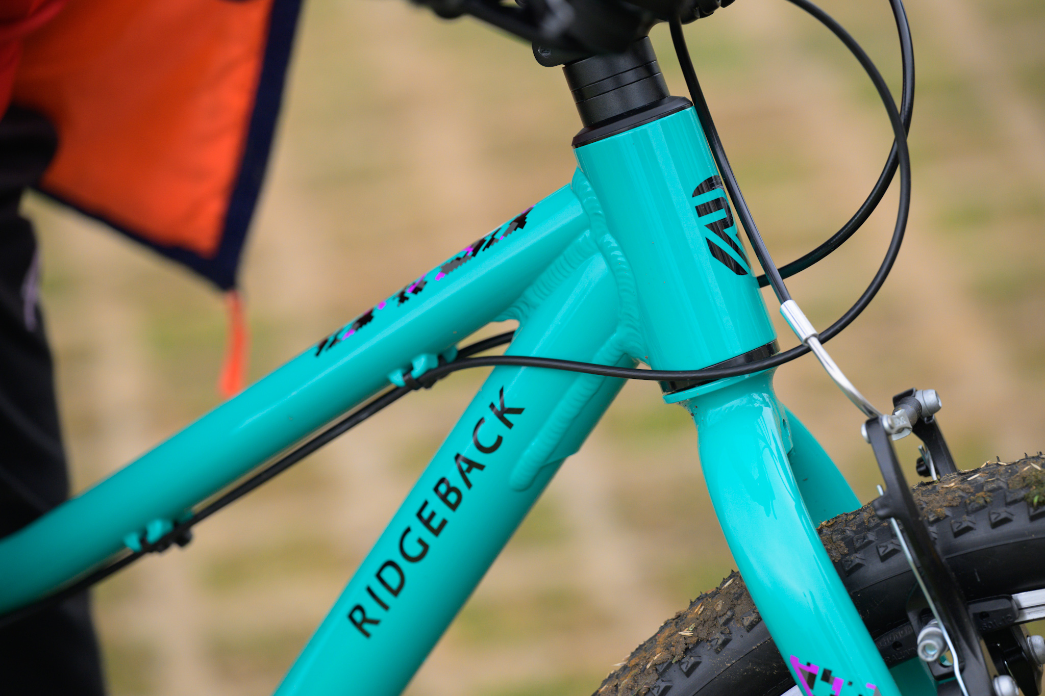 Ridgeback kids bike close up of logo and frame of the bike - turquoise 